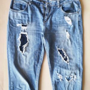 basting the patches, mending jeans
